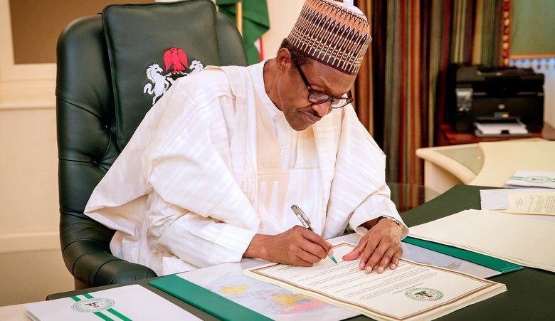 Buhari Signs Bills On Electoral Act, Money Laundering, Terrorism