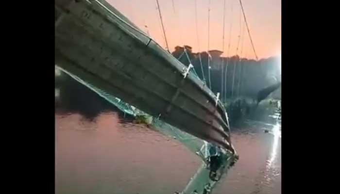 60 dead as India bridge collapses