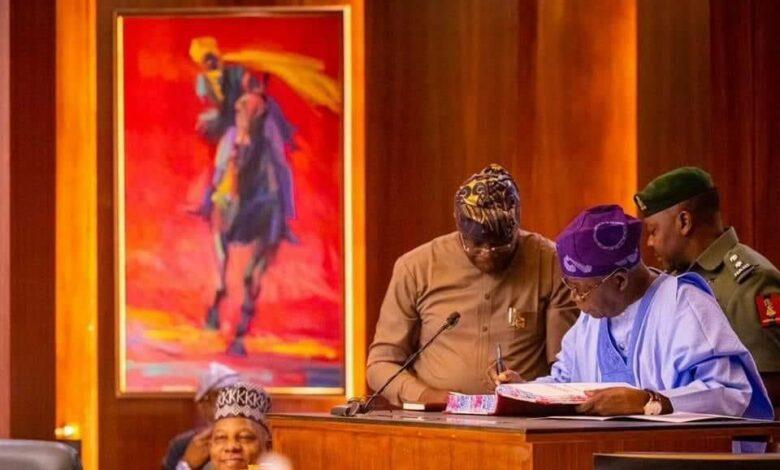 BREAKING: Tinubu signs first bill into law