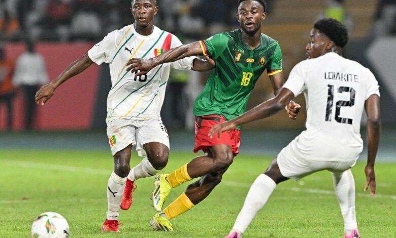 Guinea hold Cameroon with 10-men